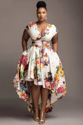 Xpluswear Design Plus Size Wedding Guest White Floral Wrap Neck High Low Hem Pocket Midi Dresses